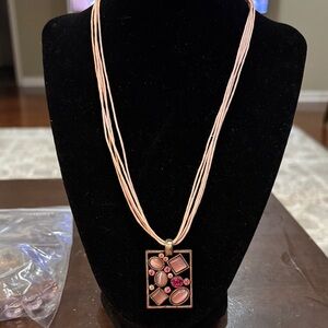 Multi-Strand Pink Pendant Necklace with Gemstone Accents